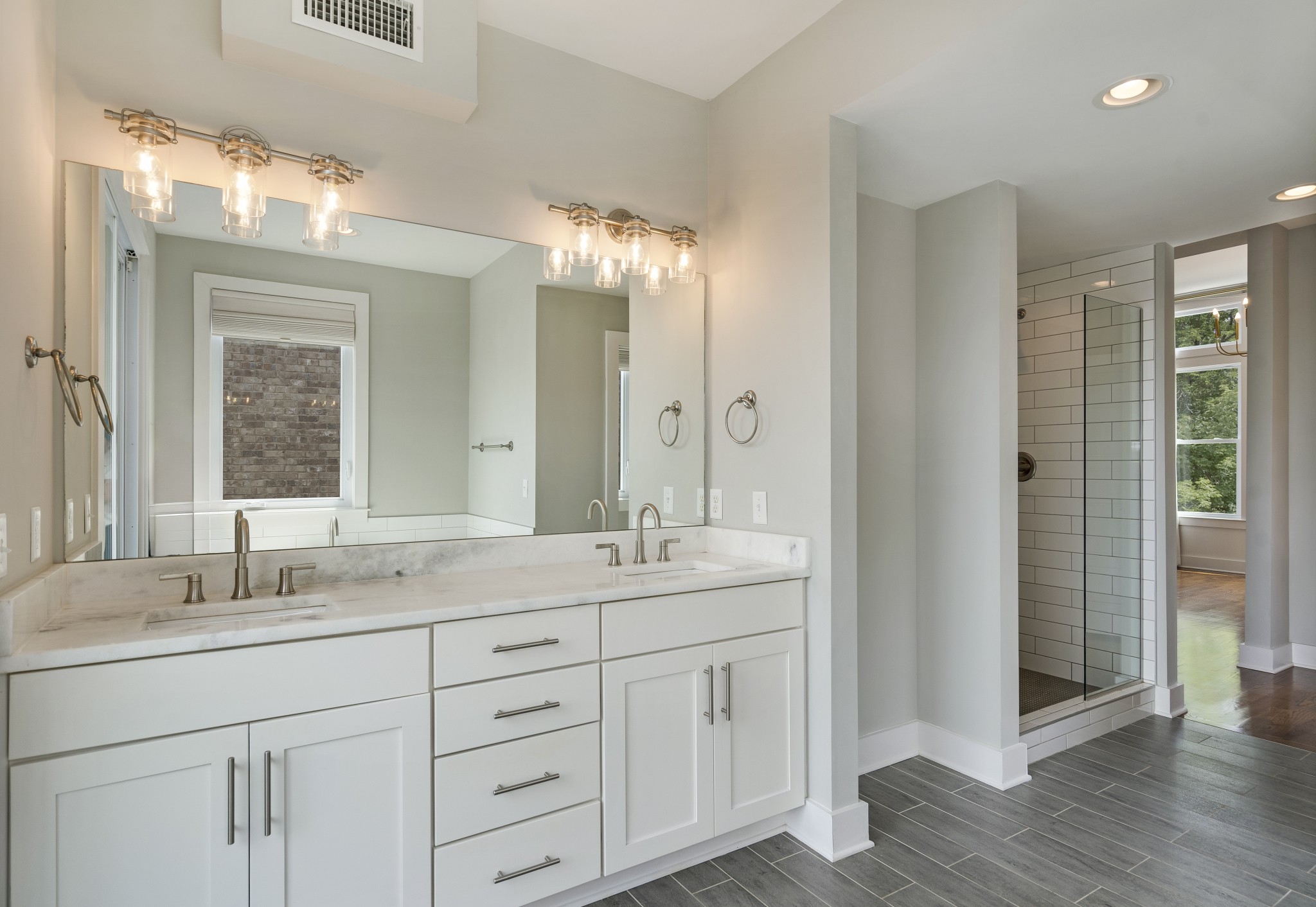 119 Demoss Road Nashville, TN 37209 - Photo 30 of 49 a bathroom with a double vanity sink and a mirror