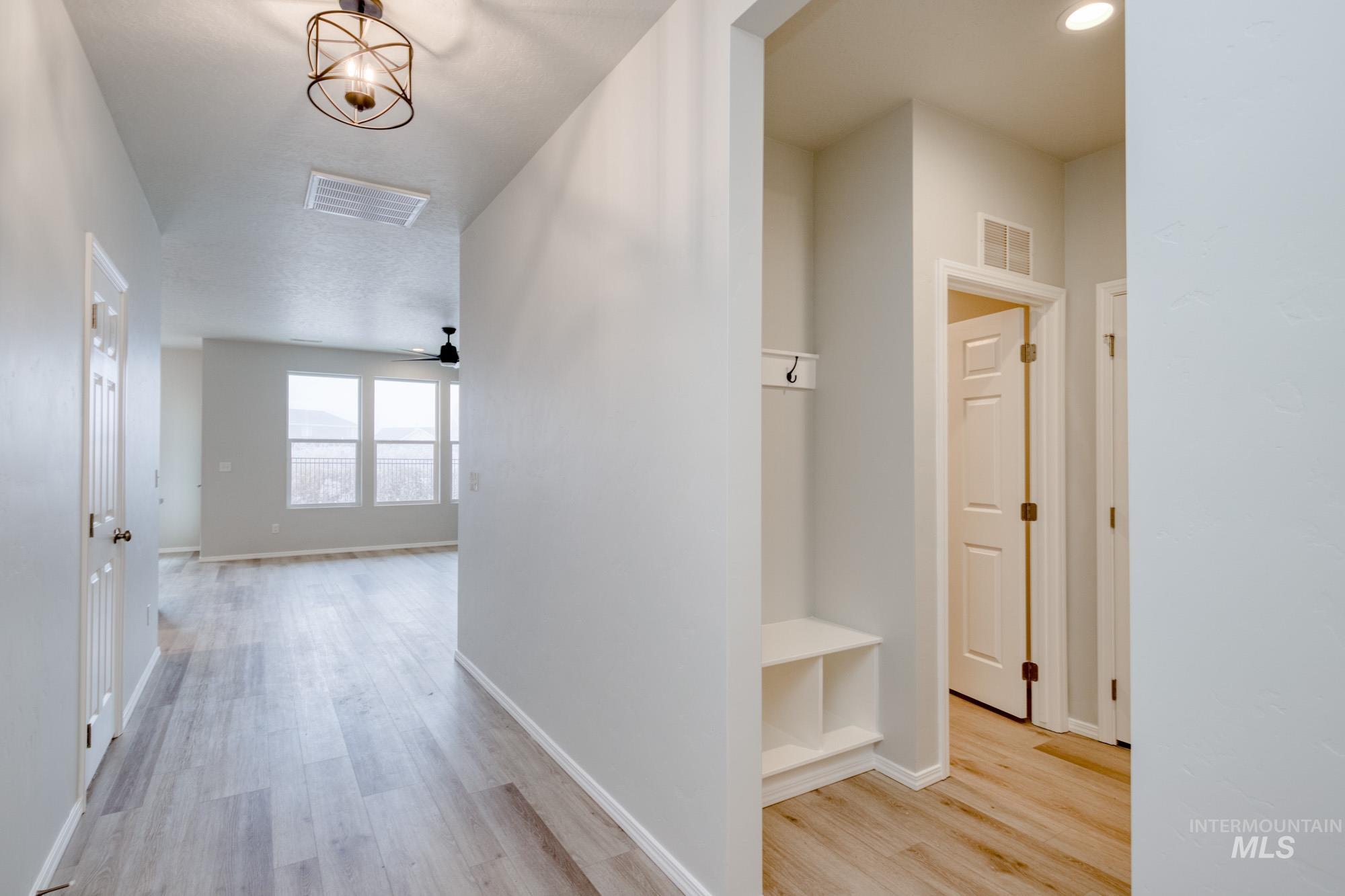 13740 Judson Street Caldwell, ID 83607 - Photo 15 of 23 Hallway with light wood-style flooring