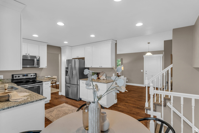 11976 Woodridge Road Sandy, UT 84094 - Photo 10 of 40 Semi-formal dining open to kitchen and family room