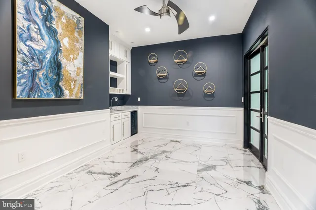a kitchen with stainless steel appliances granite countertop a stove and a sink
