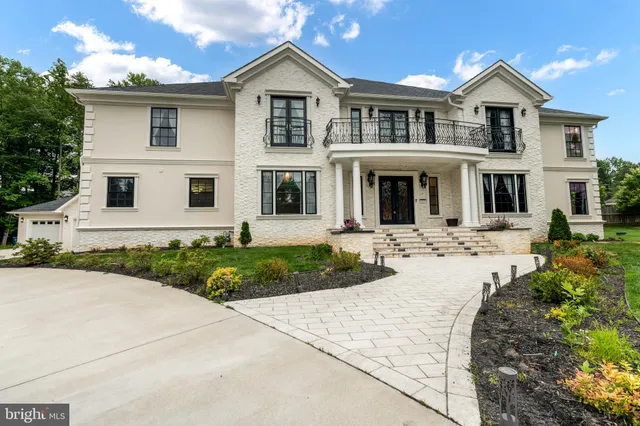 a front view of a house with yard