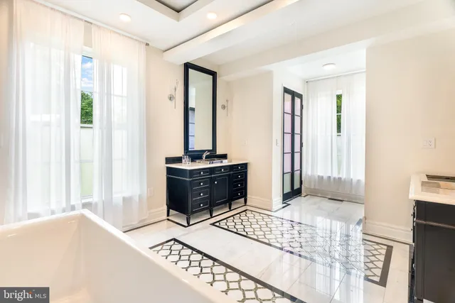 a bathroom with a toilet and a bathtub