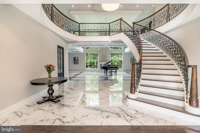 a view of entryway livingroom and hall