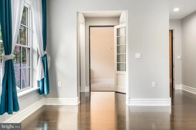 a bathroom with a shower and a sink