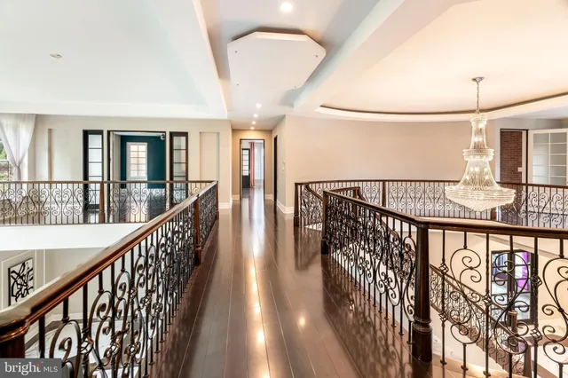 a white toilet sitting next to a shower