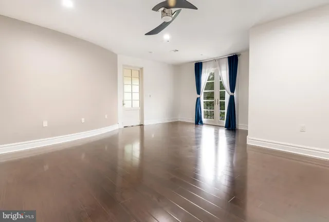 a view of a white building among the street