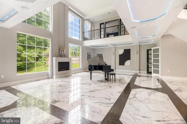 a view of a livingroom with furniture and window
