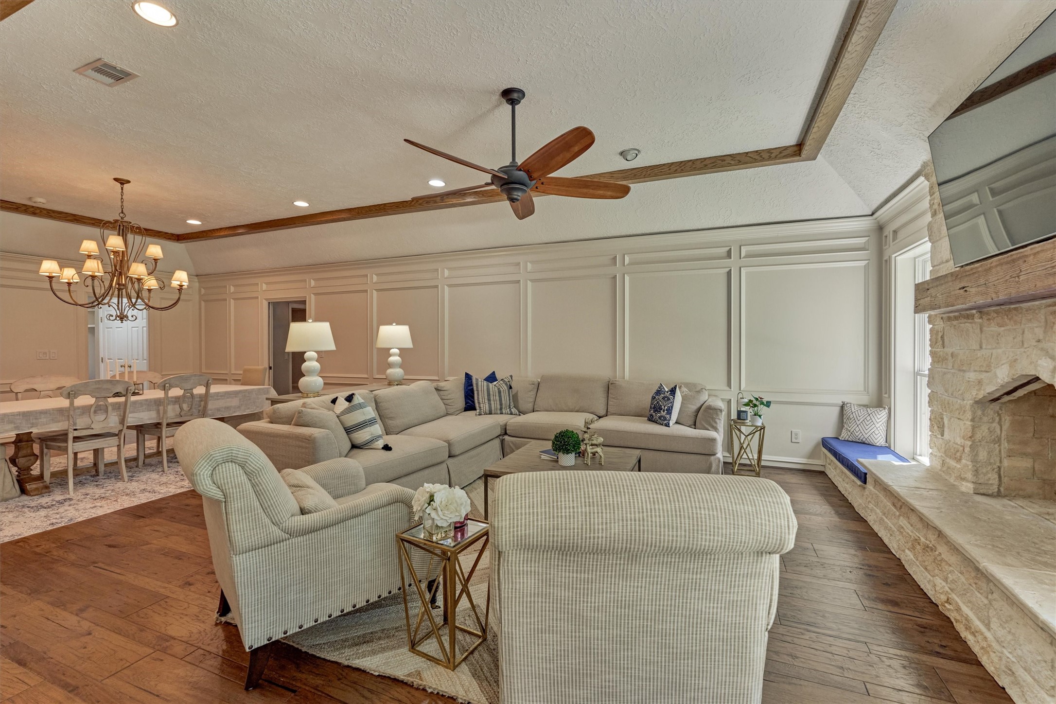 8 Wind River Court Conroe, TX 77384 - Photo 21 of 50 Warm and inviting, this den opens to the dining room for ease of entertaining!
