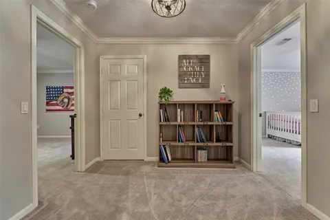 a view of a livingroom with a workspace