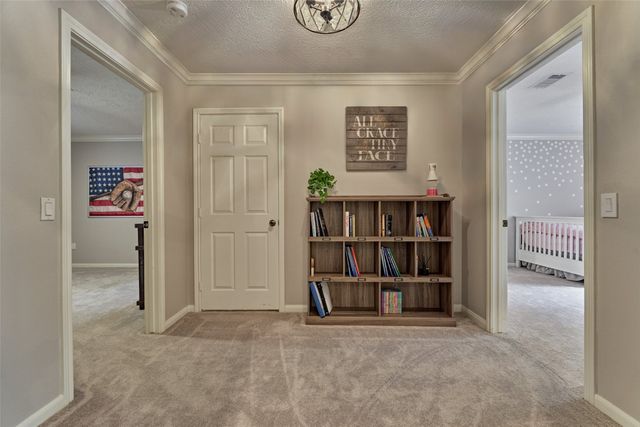 a view of a livingroom with a workspace