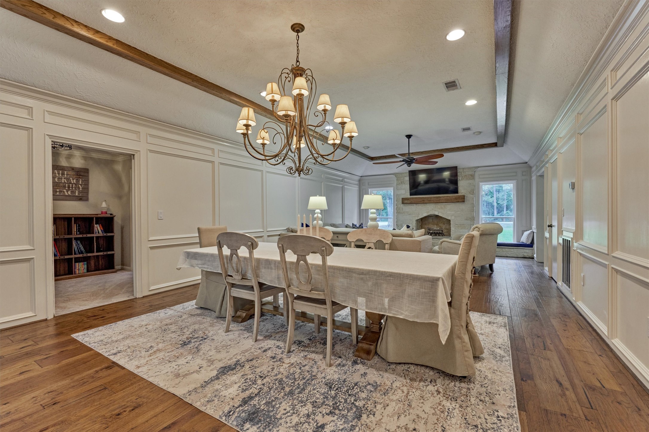 8 Wind River Court Conroe, TX 77384 - Photo 22 of 50 Two en suite secondary bedrooms sit on this side of the home off the main living area.