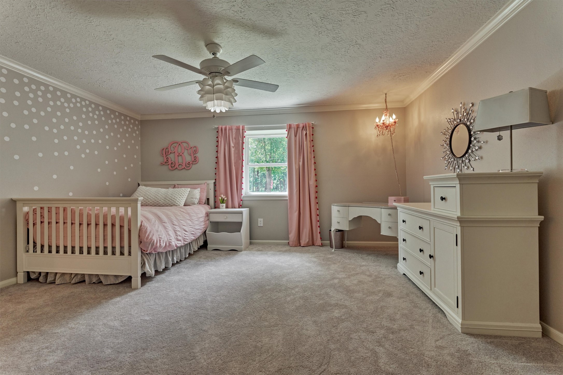 8 Wind River Court Conroe, TX 77384 - Photo 27 of 50 Bedroom 4 offers a large footprint and stylish design elements.