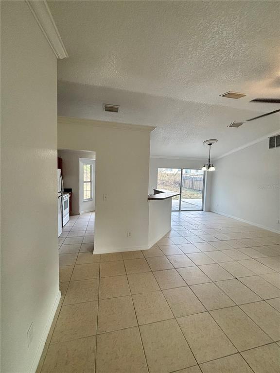 6605 Southwest 129th Loop Ocala, FL 34473 - Photo 3 of 21 a view of a livingroom and a bathroom with sink mirror and bathtub