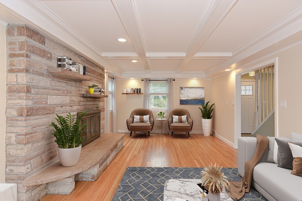 346 Highland Street Dedham, MA 02026 - Photo 12 of 42 a living room with furniture and a potted plant