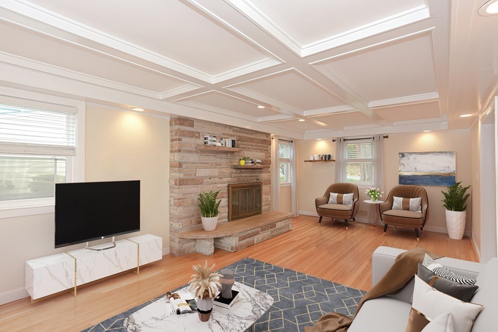 346 Highland Street Dedham, MA 02026 - Photo 14 of 42 a living room with furniture and a flat screen tv