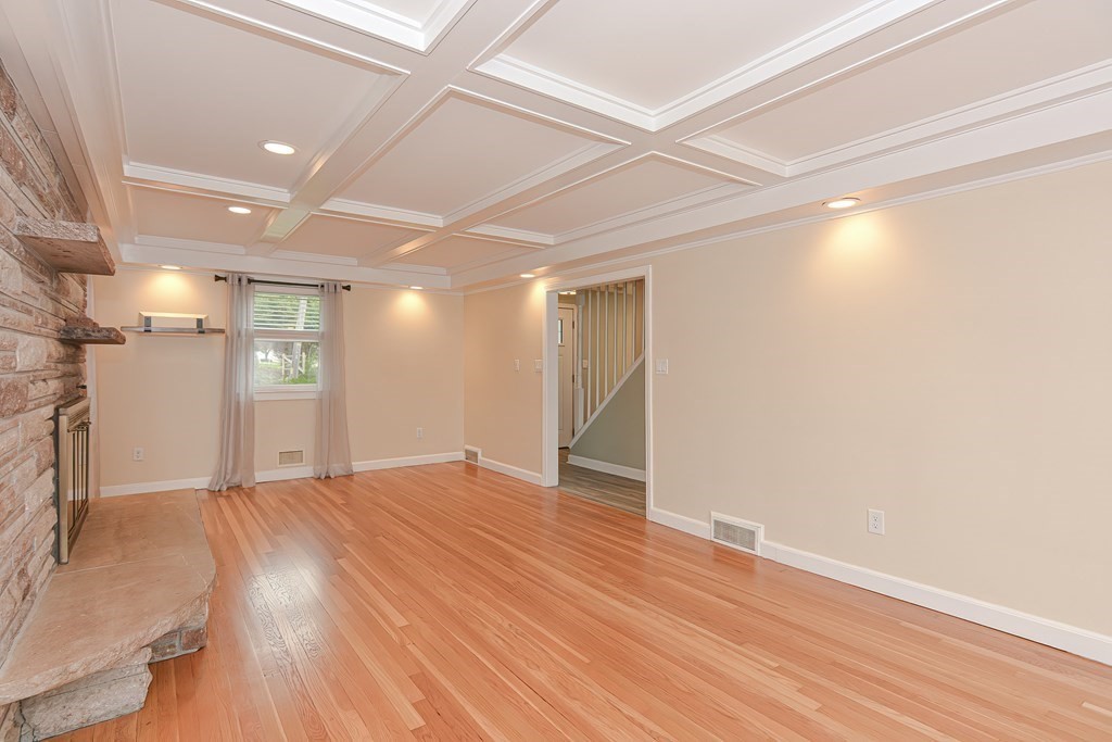 346 Highland Street Dedham, MA 02026 - Photo 15 of 42 a view of an empty room with wooden floor