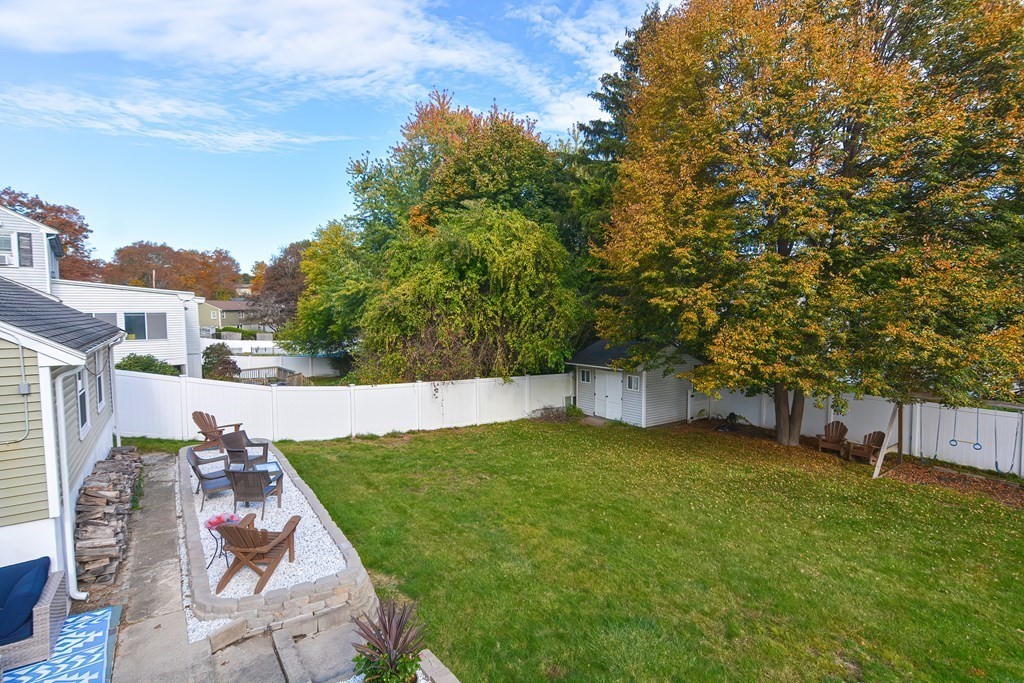 346 Highland Street Dedham, MA 02026 - Photo 39 of 42 a view of backyard with large trees