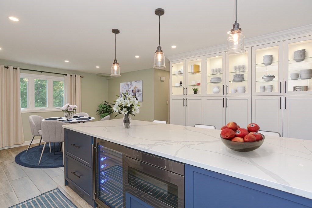 346 Highland Street Dedham, MA 02026 - Photo 5 of 42 a kitchen with a sink and cabinets