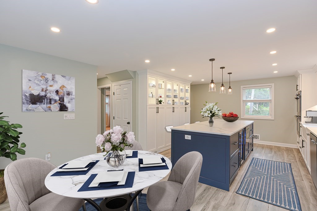 346 Highland Street Dedham, MA 02026 - Photo 6 of 42 a dining room with furniture and wooden floor