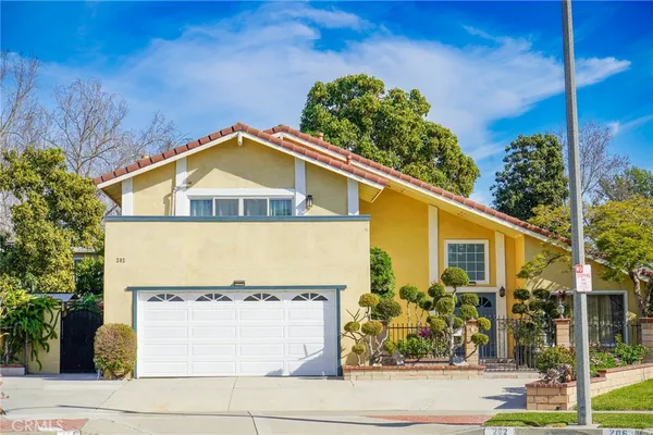 a view of a house with a garage