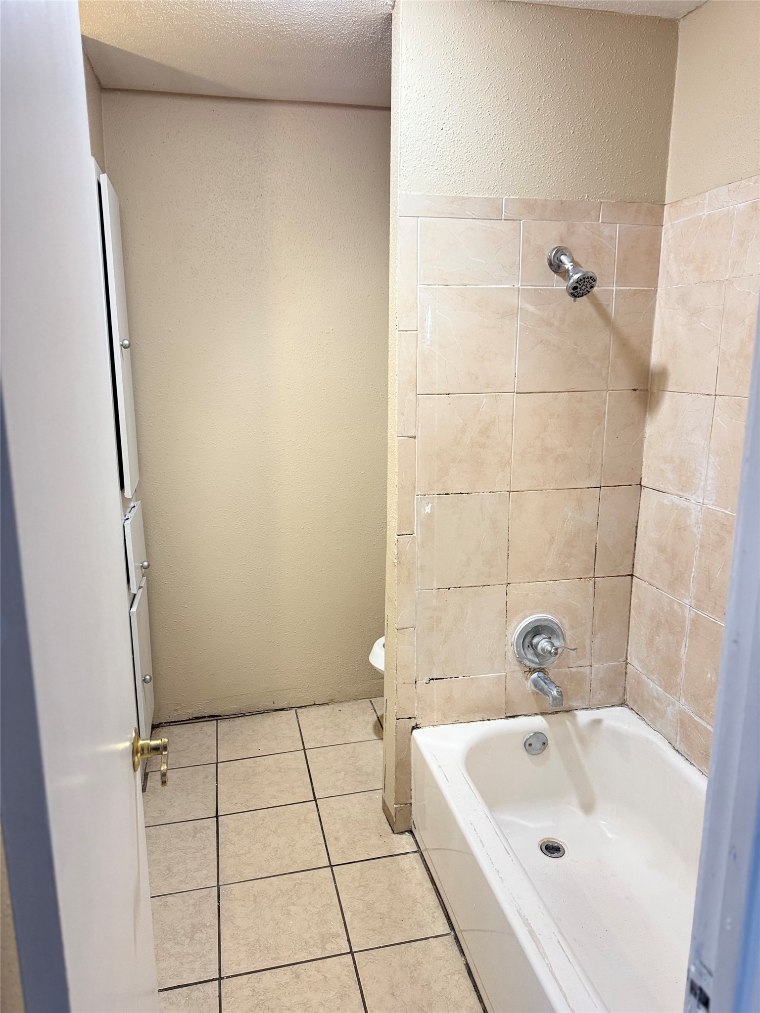 7818 Grove Ridge Drive Houston, TX 77061 - Photo 7 of 7 a bathroom with a tub and sink