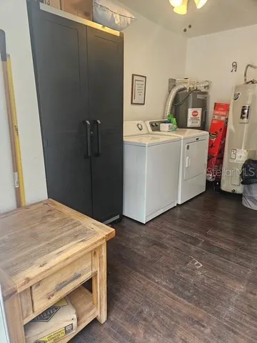 a utility room with dryer and washer