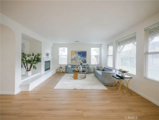 a view of a living room filled with furniture