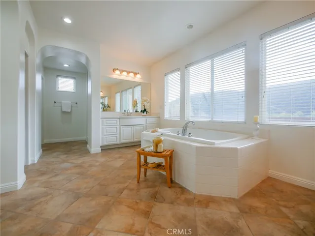a view of a living room and a large window