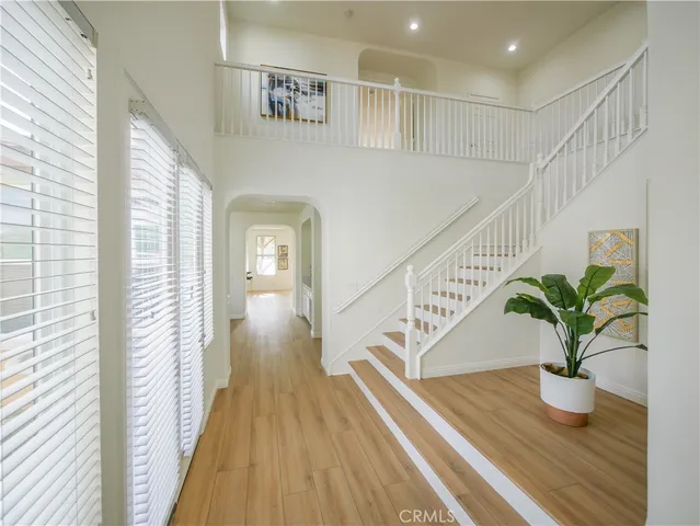 a view of entryway with wooden floor