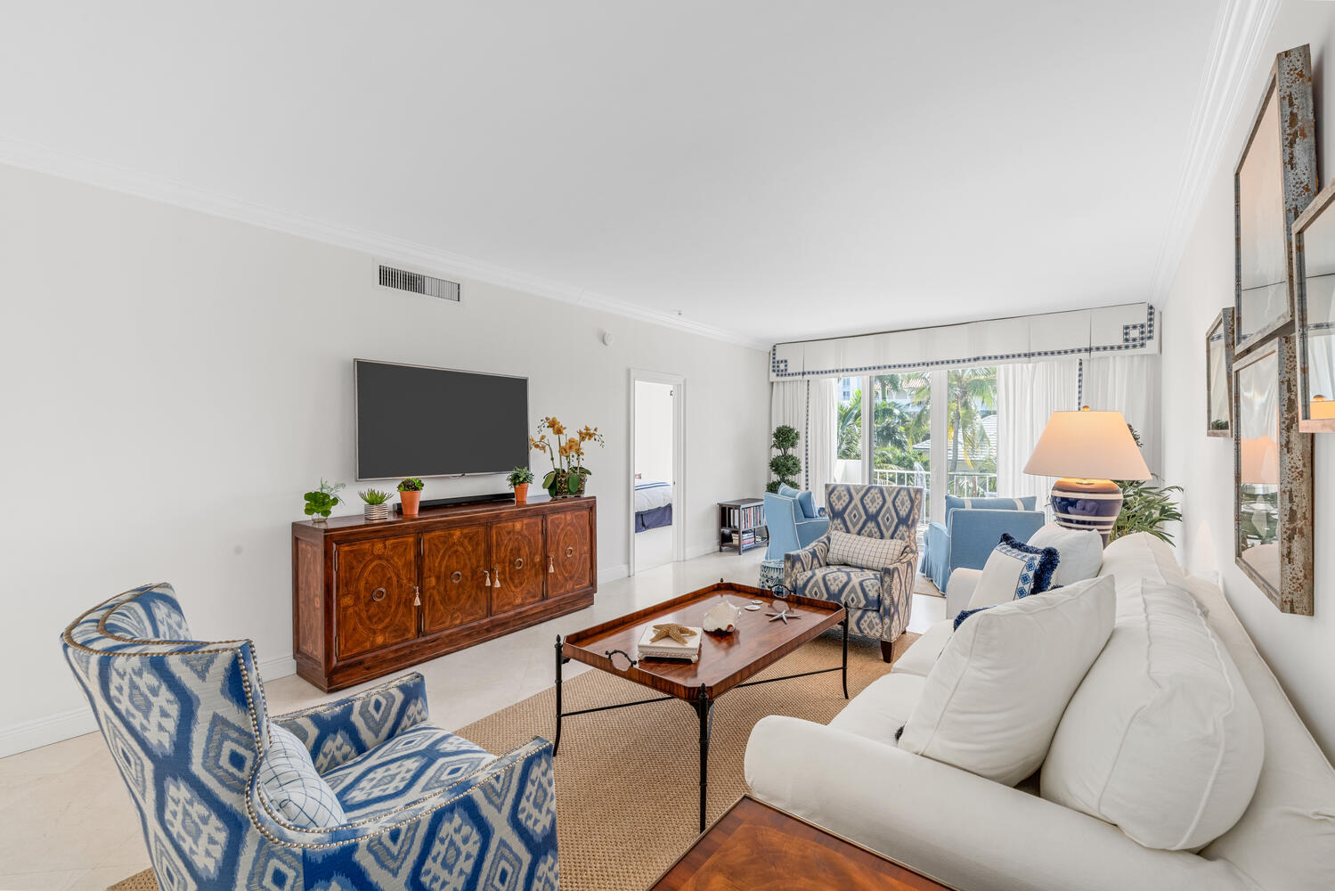 127 Peruvian Avenue, Unit 302 Palm Beach, FL 33480 - Photo 20 of 43 a living room with furniture and a flat screen tv