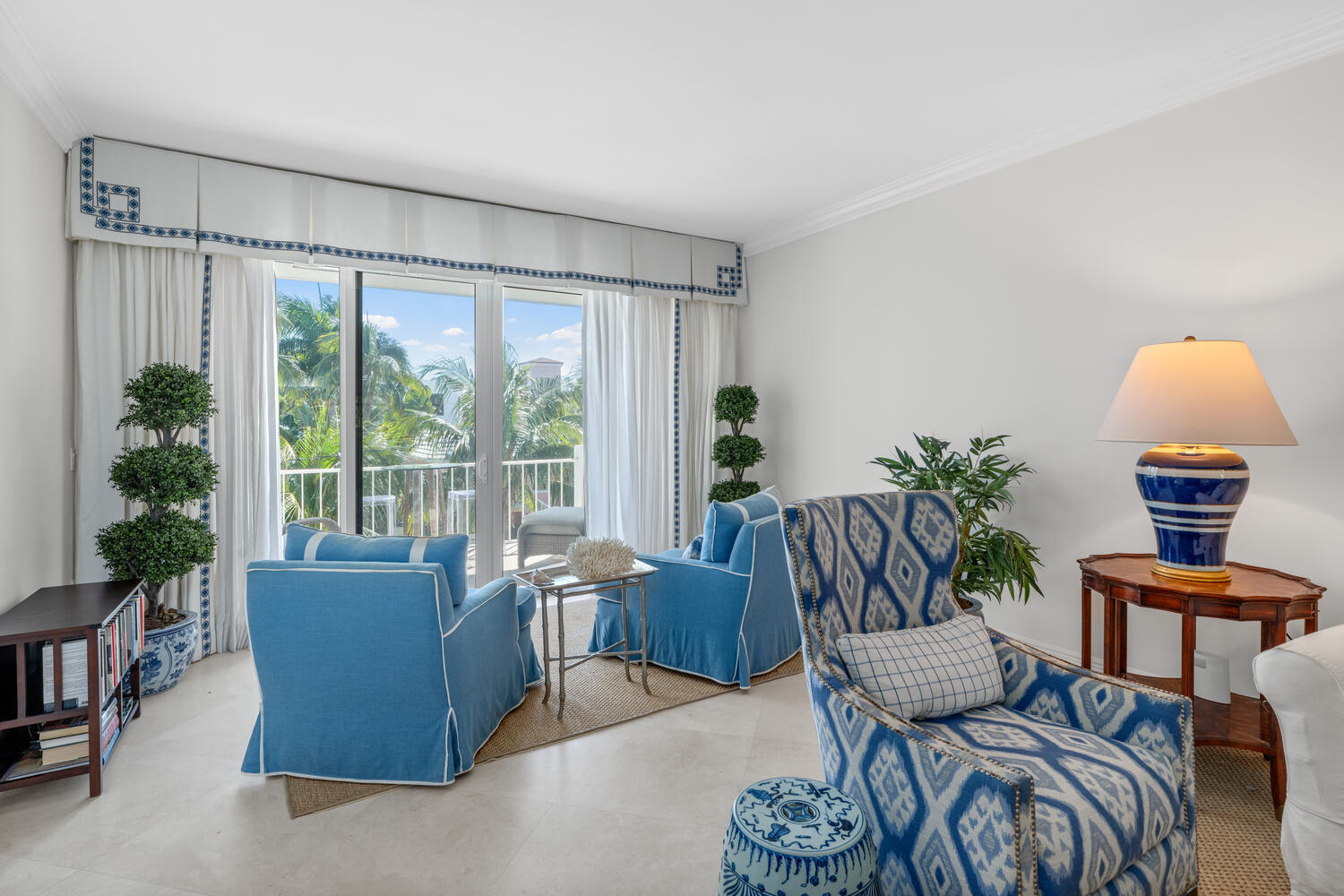 127 Peruvian Avenue, Unit 302 Palm Beach, FL 33480 - Photo 24 of 43 a view of a livingroom with furniture a rug and a potted plant
