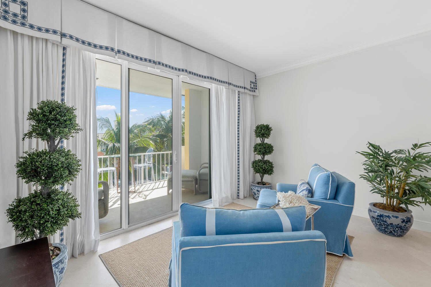 127 Peruvian Avenue, Unit 302 Palm Beach, FL 33480 - Photo 26 of 43 a living room with furniture and a potted plant