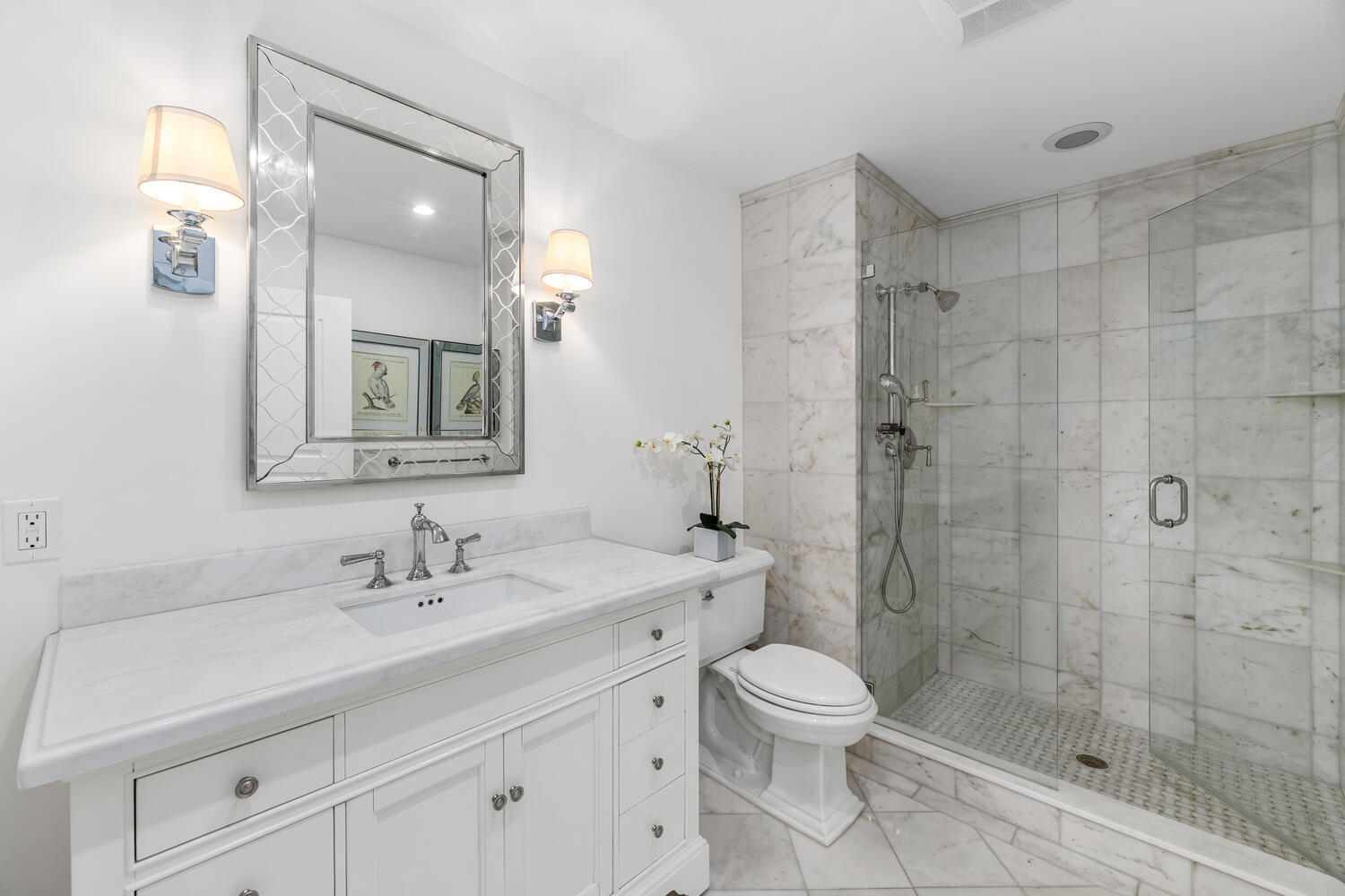 127 Peruvian Avenue, Unit 302 Palm Beach, FL 33480 - Photo 32 of 43 a bathroom with a sink a toilet and shower