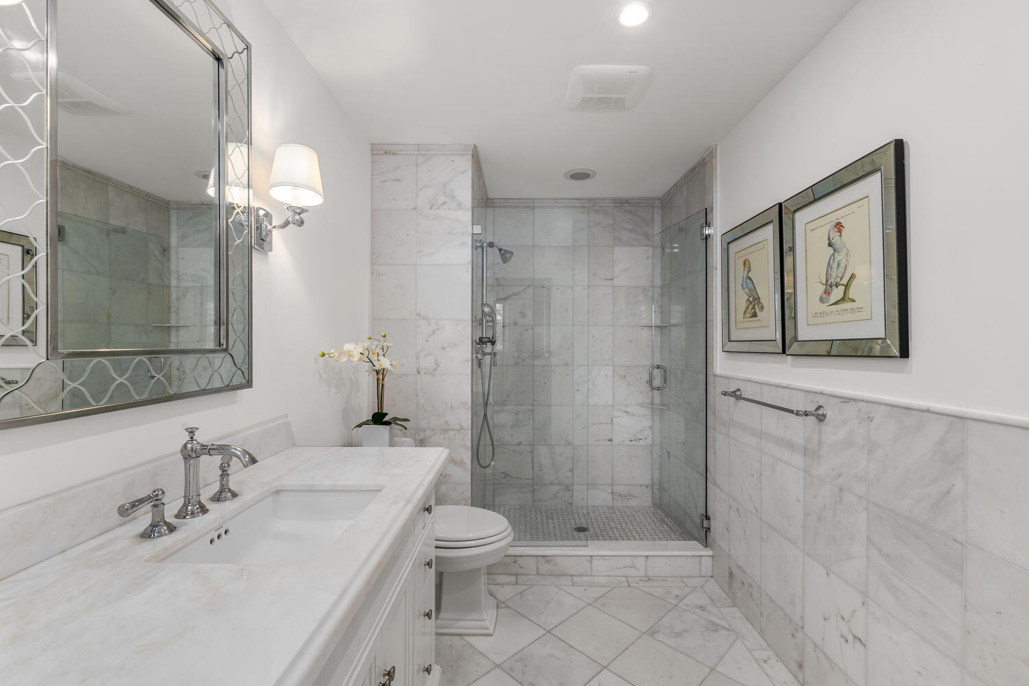 127 Peruvian Avenue, Unit 302 Palm Beach, FL 33480 - Photo 35 of 43 a bathroom with a sink toilet and shower