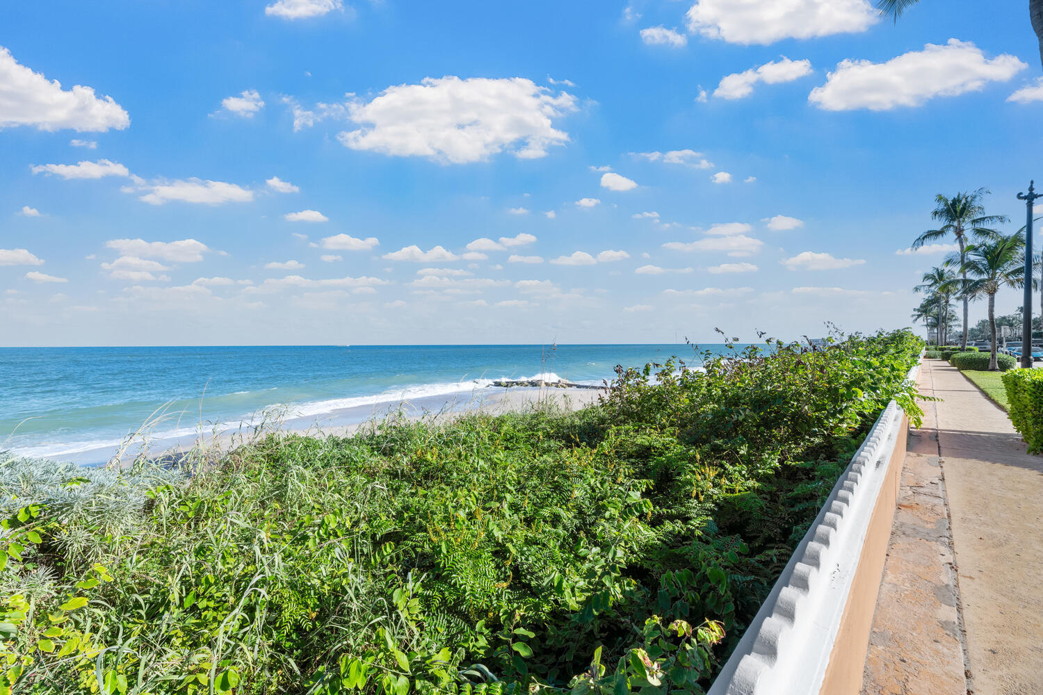 127 Peruvian Avenue, Unit 302 Palm Beach, FL 33480 - Photo 42 of 43 a view of a lake with a building in the background