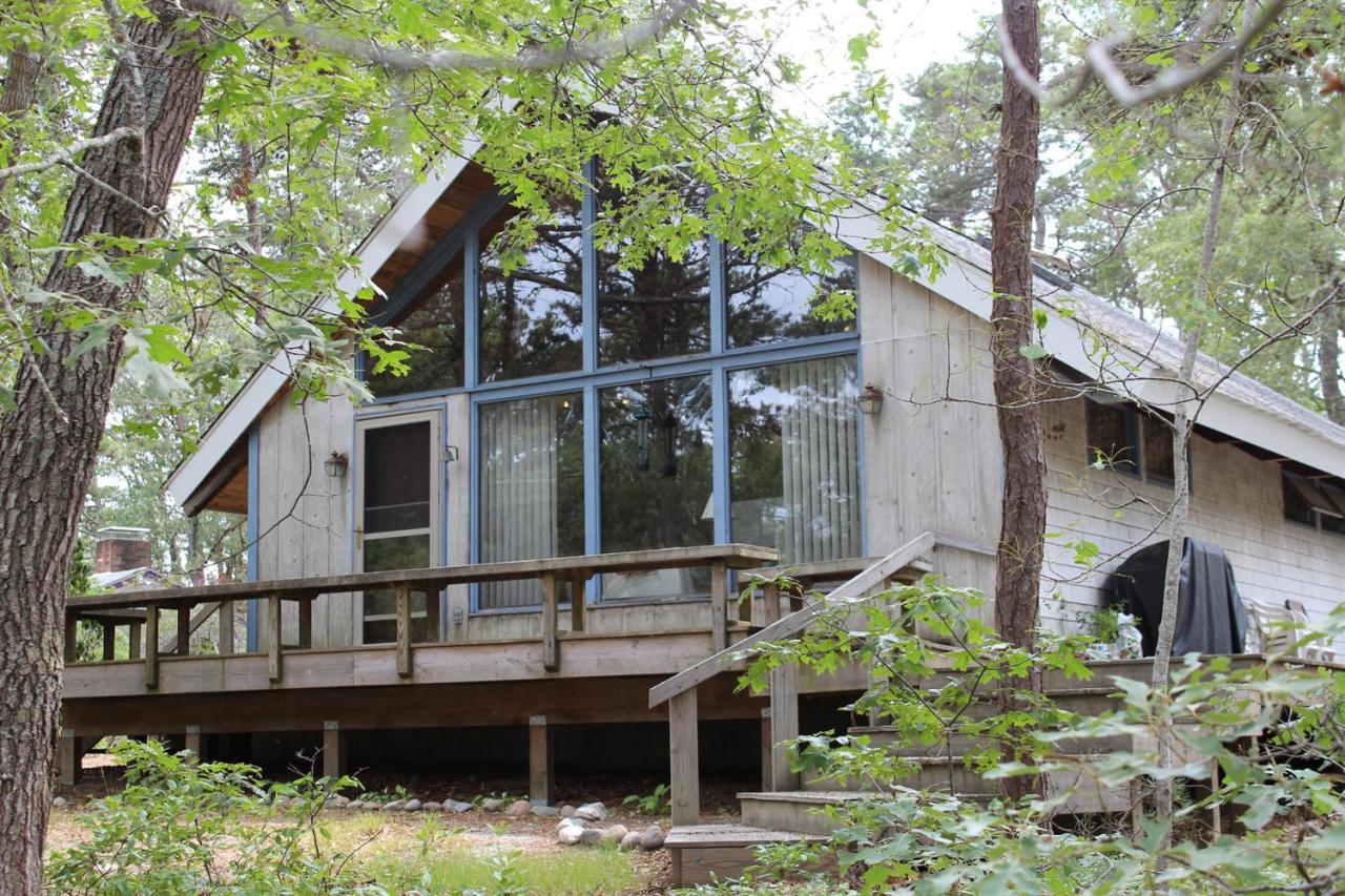 37 Bartlett Road Wellfleet, MA 02667 - Photo 2 of 14 a front view of a house with balcony