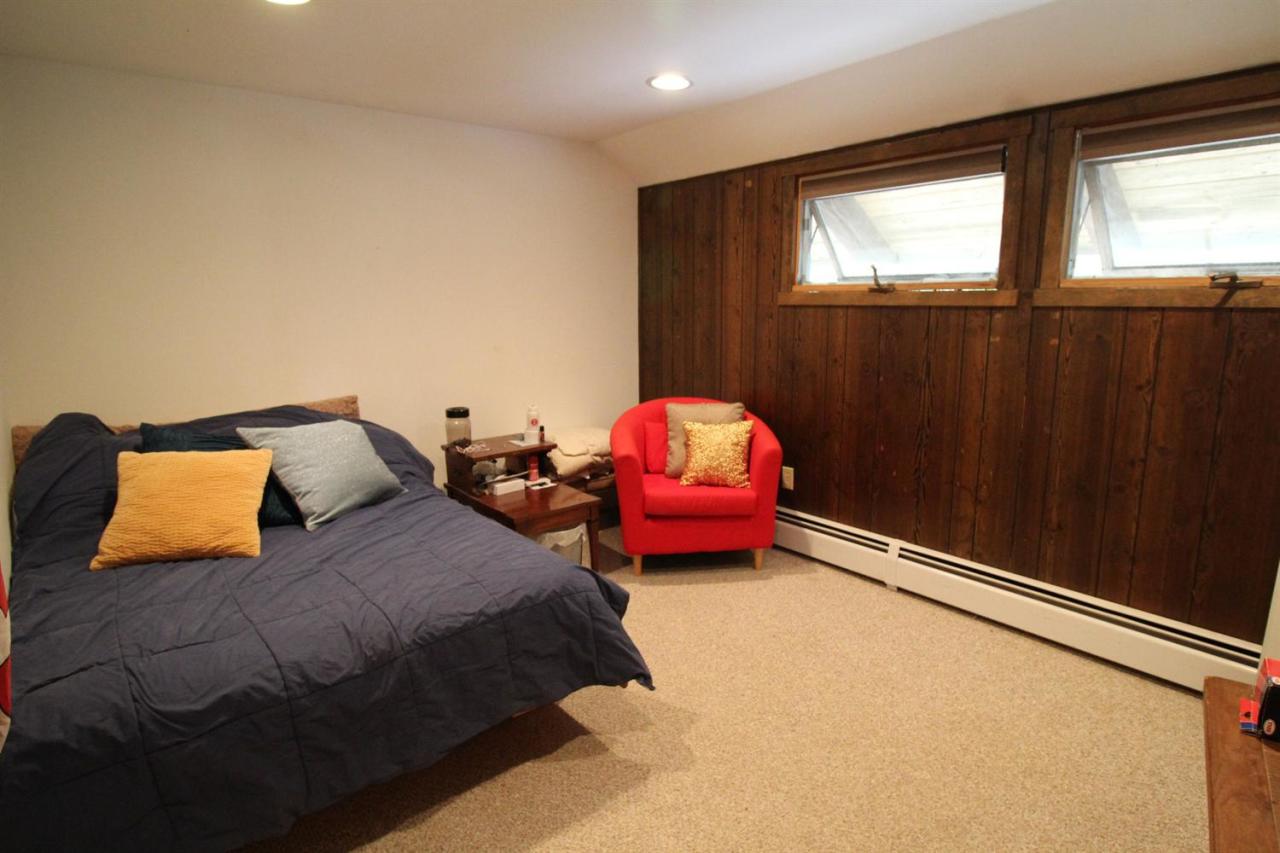 37 Bartlett Road Wellfleet, MA 02667 - Photo 7 of 14 a bedroom with a bed and window