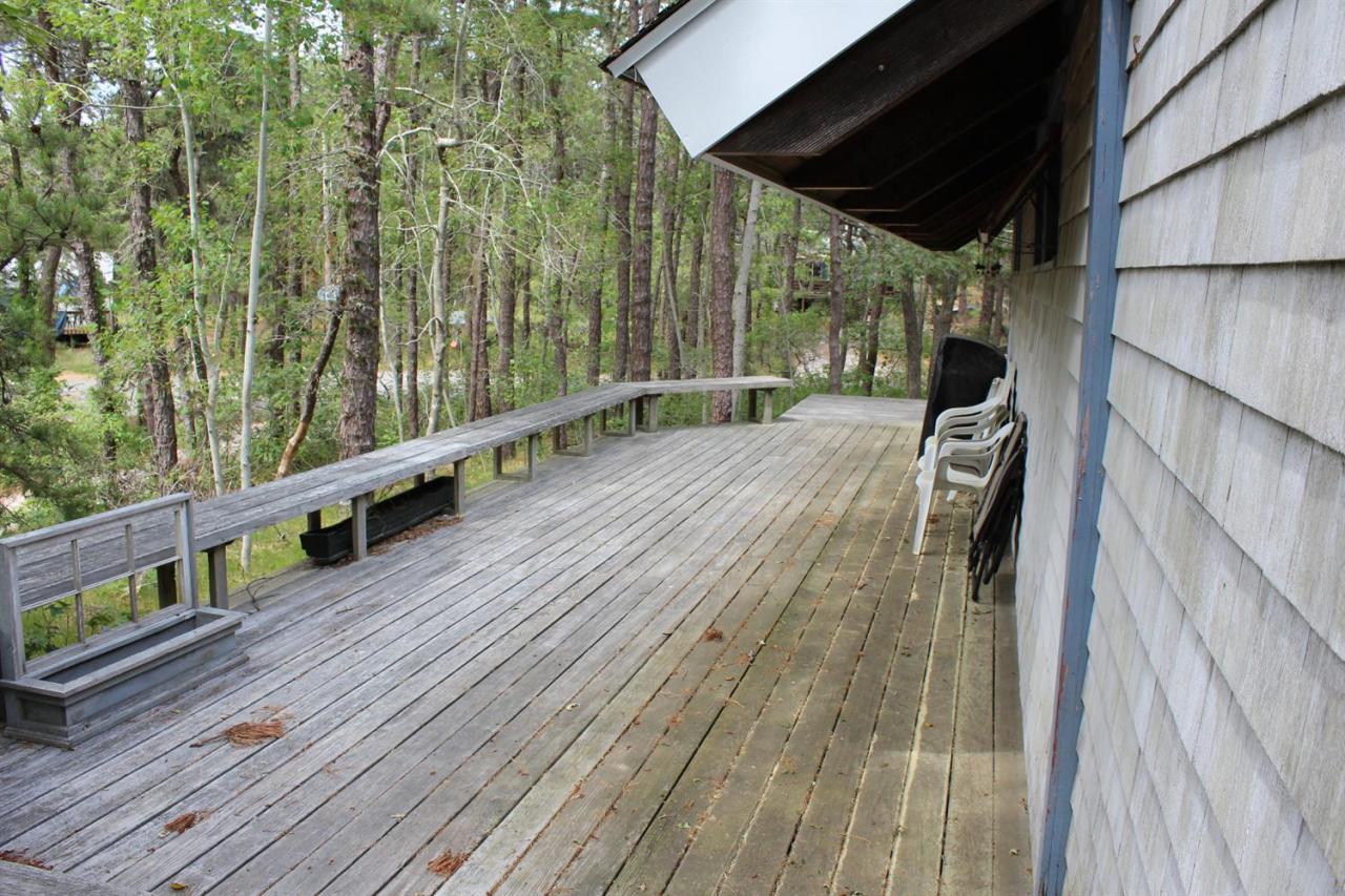 37 Bartlett Road Wellfleet, MA 02667 - Photo 9 of 14 a view of balcony with wooden floor