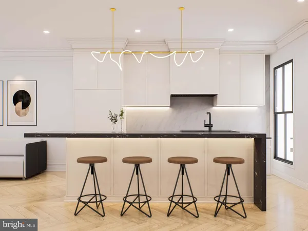 a kitchen with stainless steel appliances a table chairs in it and wooden floors
