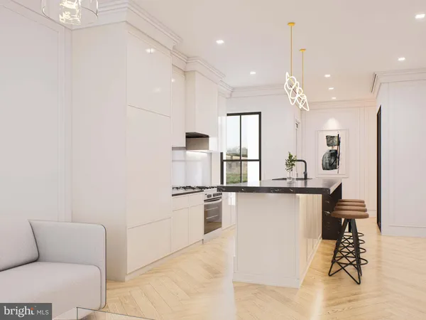 a kitchen with stainless steel appliances kitchen island hardwood floor sink and stove