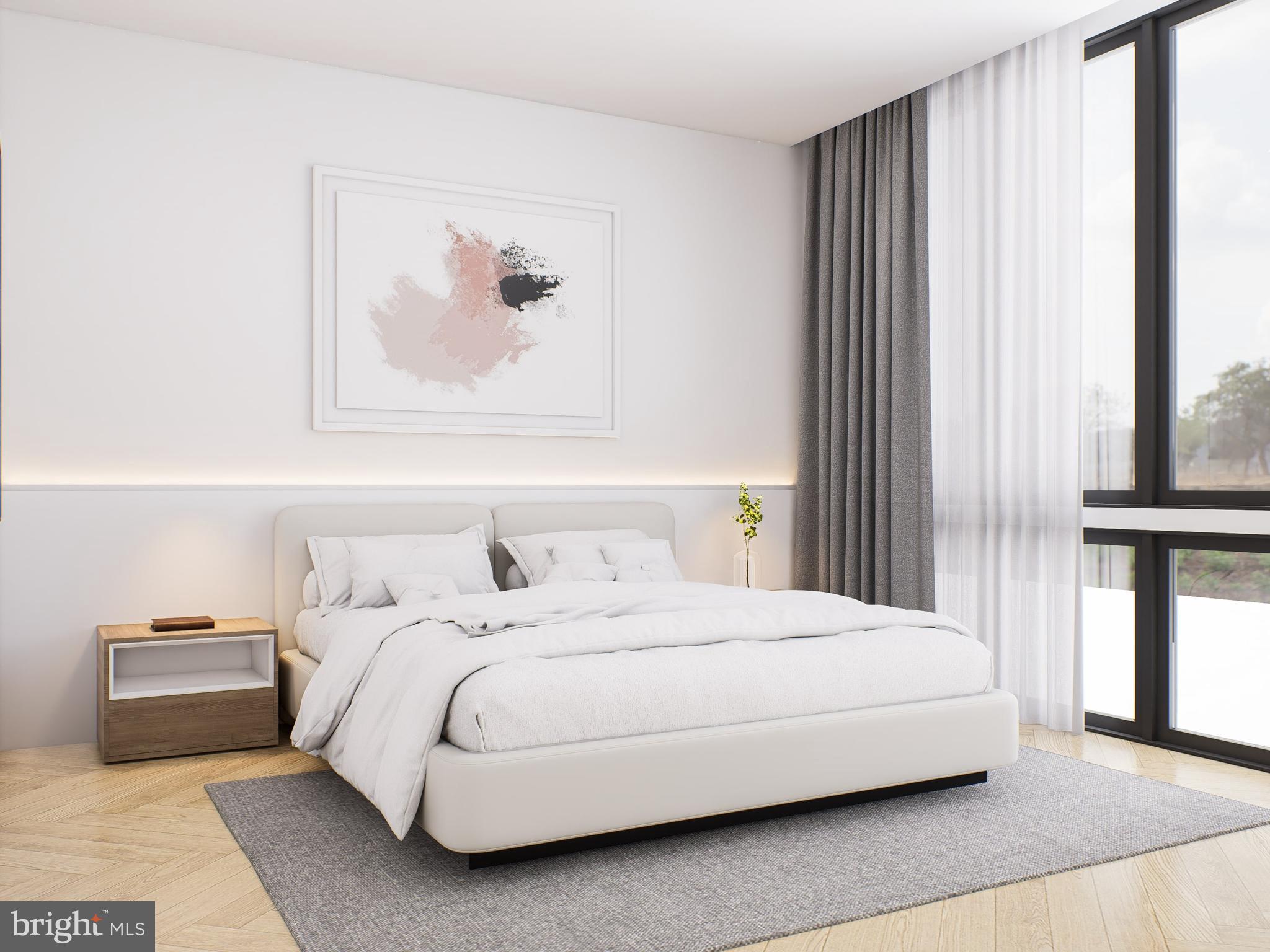 1415 Q Street Northwest, Unit 2 Washington, DC 20009 - Photo 3 of 6 a bedroom with a bed and a painting on the wall