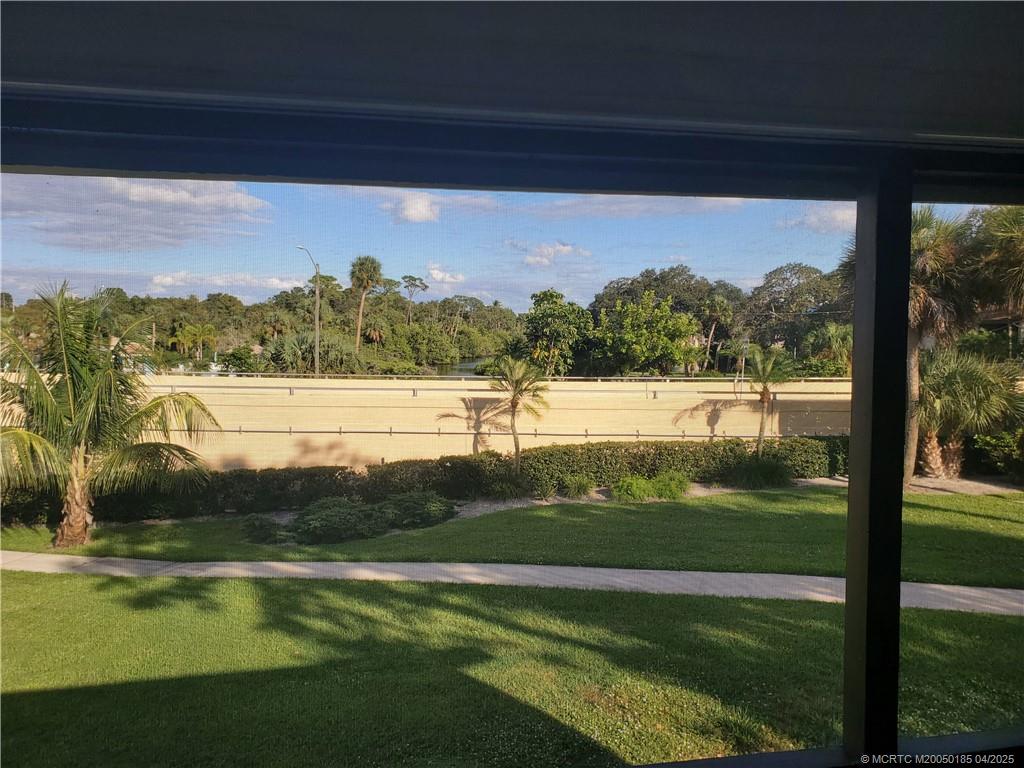 1411 Northeast 14th Court, Unit 13 Jensen Beach, FL 34957 - Photo 19 of 20 a view of lake with mountain view