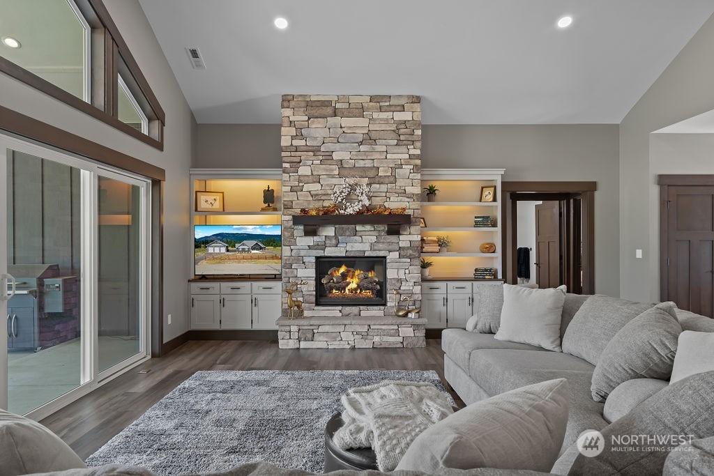 1450 Old Cedars Road Cle Elum, WA 98922 - Photo 8 of 40 a living room with furniture and a fireplace