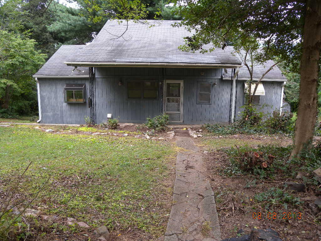155 Webster Heights Road Roanoke, VA 24012 - Photo 1 of 6 a view of a house with a yard