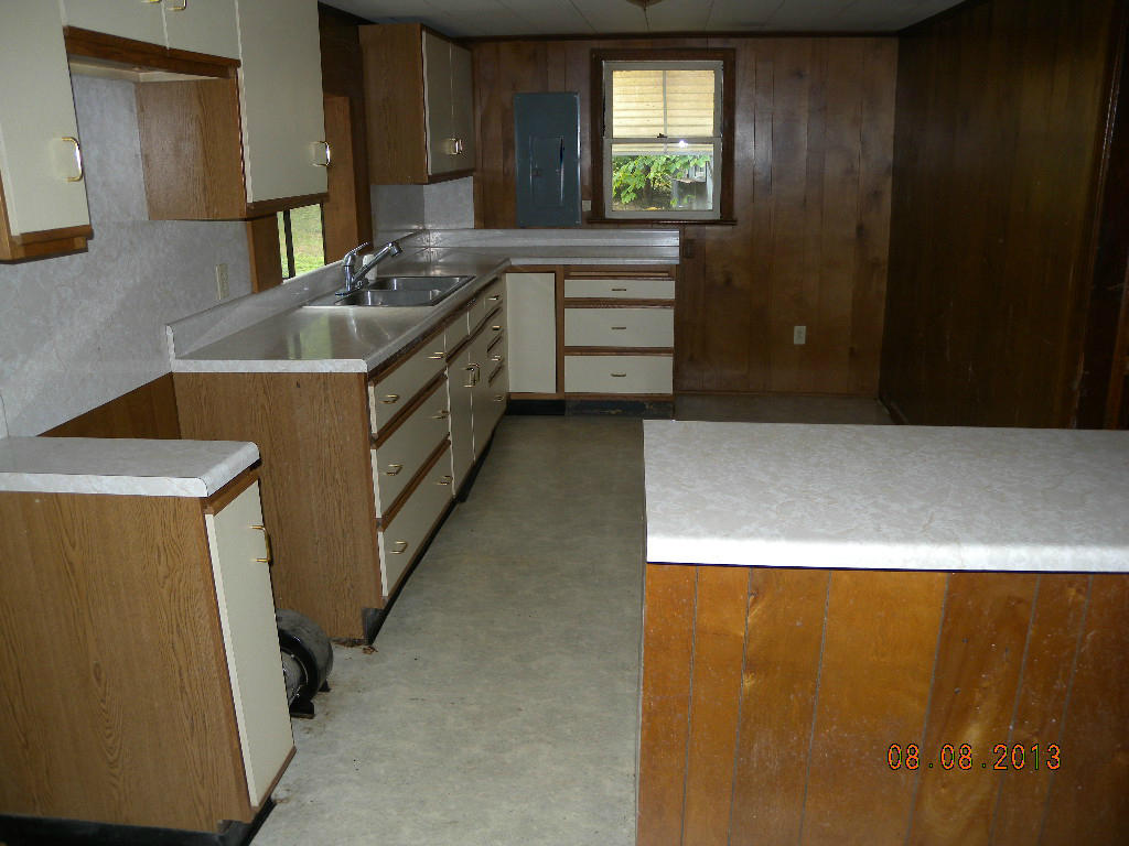 155 Webster Heights Road Roanoke, VA 24012 - Photo 5 of 6 a kitchen with a refrigerator and a sink