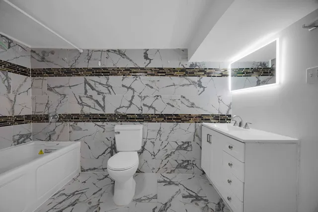 $395,000 | 8250 South Rhodes Avenue, Chicago, IL 60619