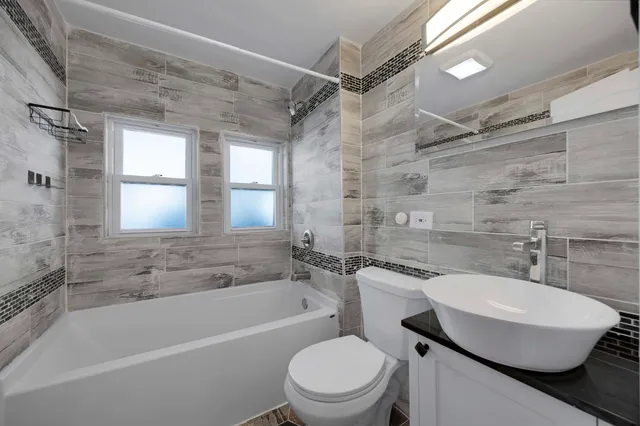 $395,000 | 8250 South Rhodes Avenue, Chicago, IL 60619