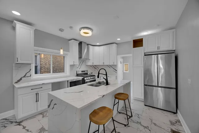 $395,000 | 8250 South Rhodes Avenue, Chicago, IL 60619