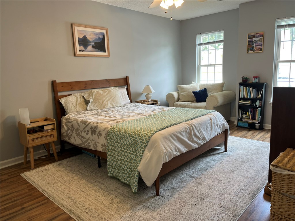 116 Arbors Court Central, SC 29630 - Photo 14 of 27 A comforting bedroom space, featuring a classic bed frame and abundant natural light.