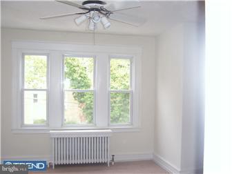 328 Kingston Road Upper Darby, PA 19082 - Photo 12 of 12 a view of empty room with a window